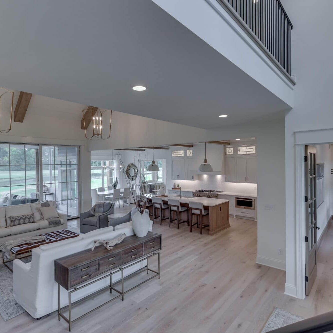 A view of a living room and dining room in a home.