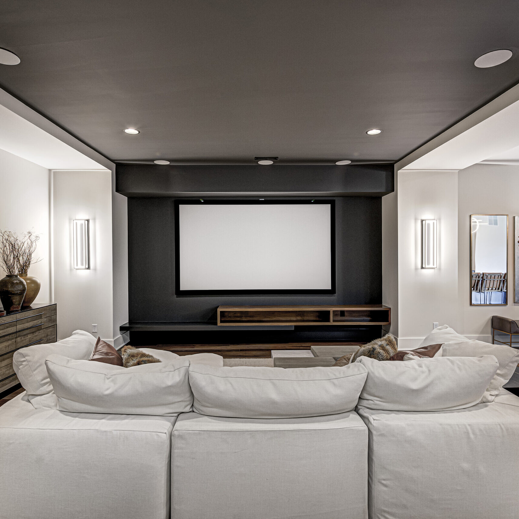 A modern living room with a flat screen tv.