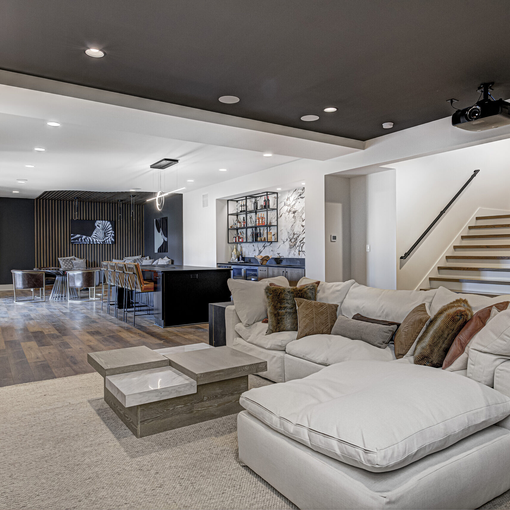 A living room with hardwood floors and a fireplace.